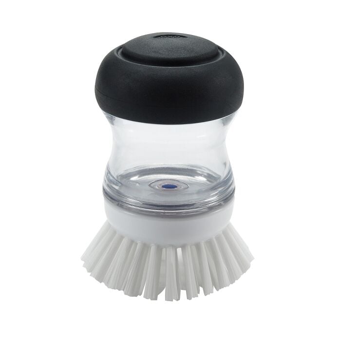 Soap Dispensing Palm Brush - US 5675