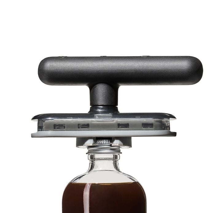 Twisting Jar Opener With Basepad - US 6022